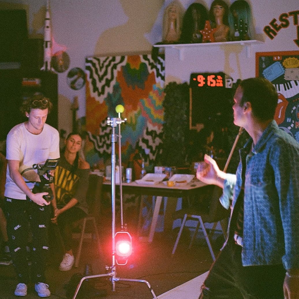 Filming on a lit set at night